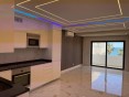 Moderní apartmán 50m od pláže s výhledem na moře na prodej, Algarve
