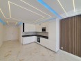 Moderní apartmán 50m od pláže s výhledem na moře na prodej, Algarve
