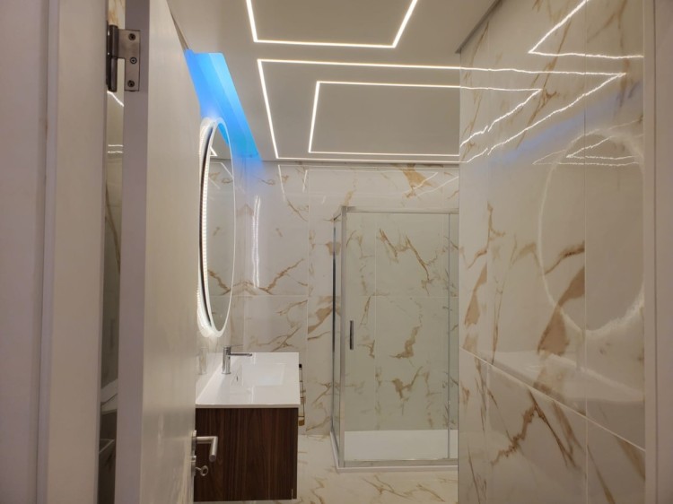Moderní apartmán 50m od pláže s výhledem na moře na prodej, Algarve