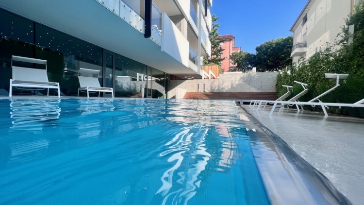 Designový apartmán v rezortu s bazénem v Lido di Jesolo