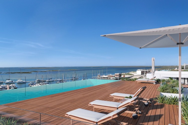 Luxusní apartmány s výhledem na moře v novém kondominiu na prodej v Olhão, Algarve.