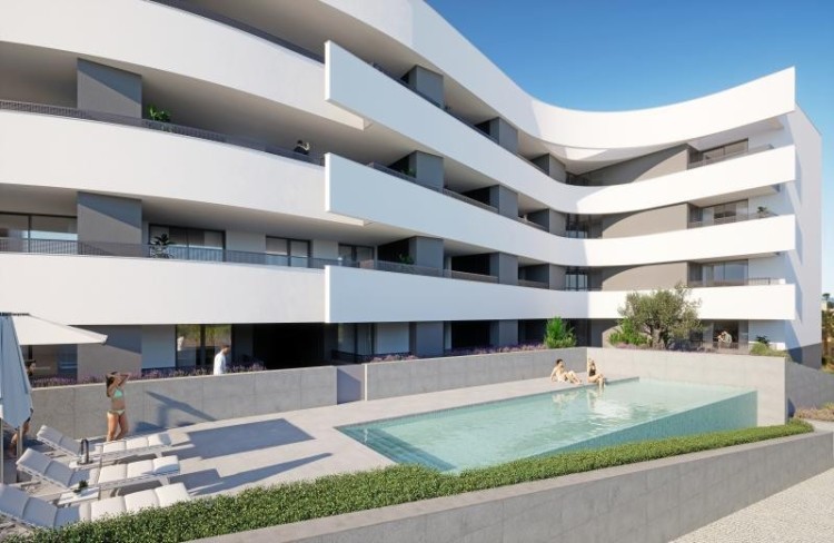 Nové apartmány 300m od pláže, s bazénem a posilovnou na prodej, Porto de Mos, Algarve